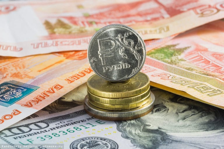 Почему аналитики готовят негативный прогноз для доллара и курса рубля